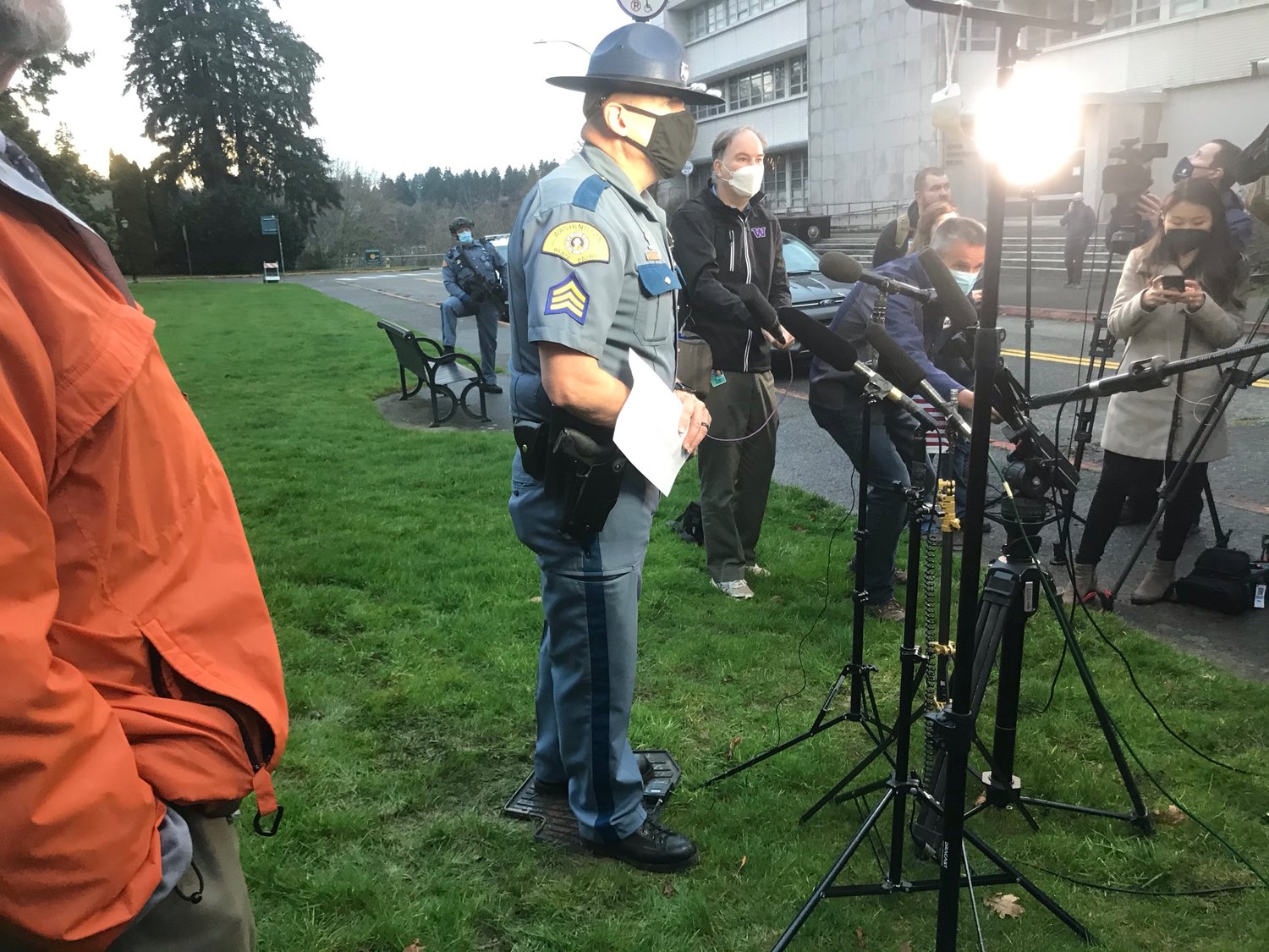 Washington State Patrol Public Information Officer Darren Wright addresses a crowd of reporters on the Capitol Campus in Olympia on Wednesday, Jan. 6, 2020.