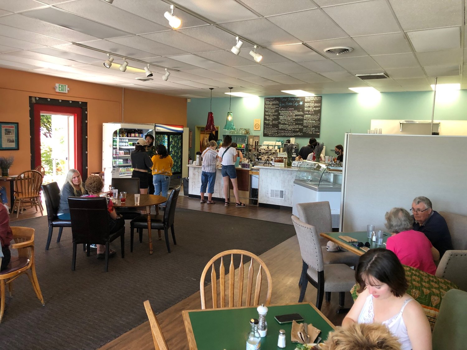 With a new paint job and door to the new covered patio, New Traditions Cafe is much brighter than before its 2021remodel.