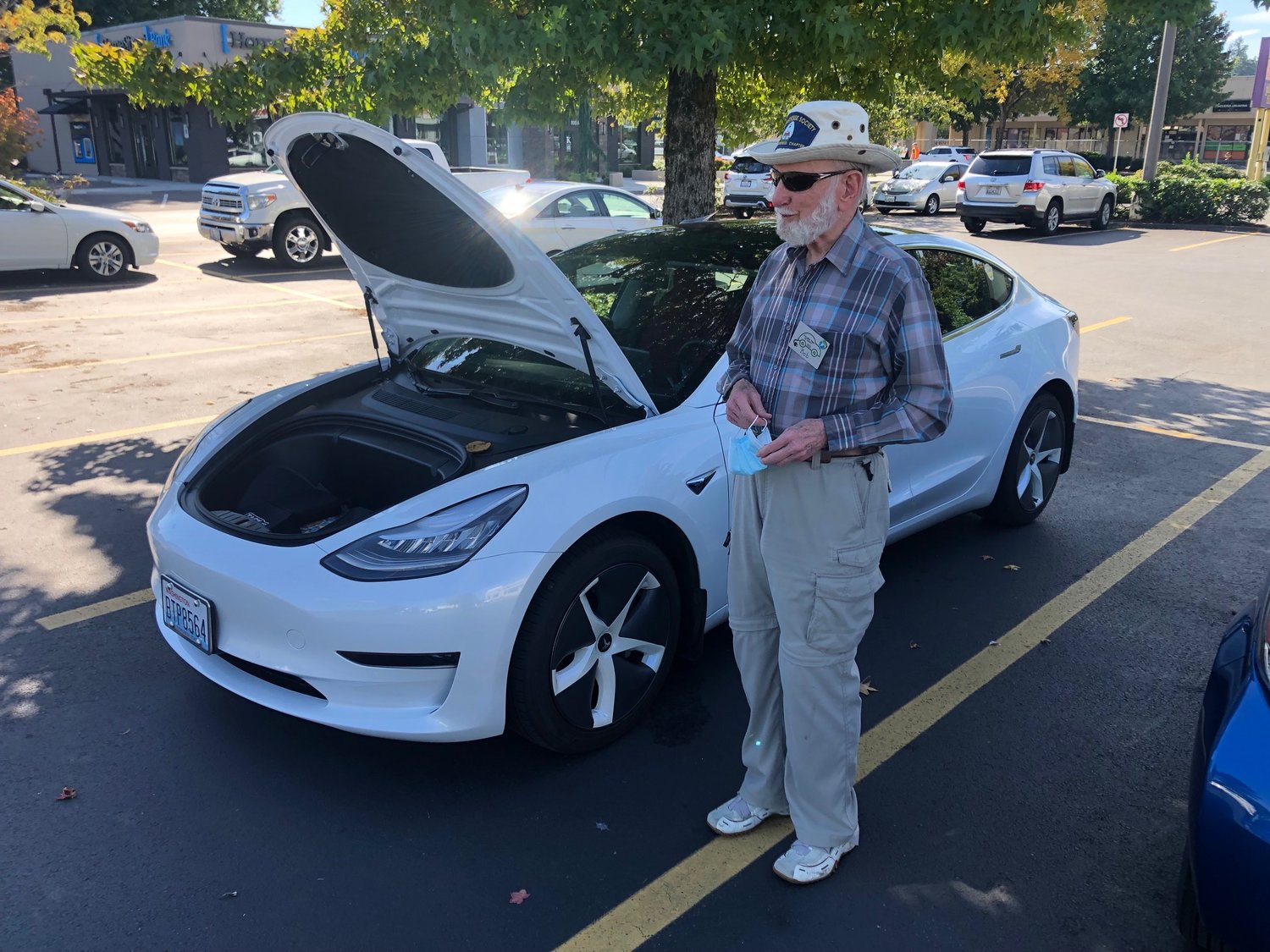 Bob Anderson of Lacey gave visitors tours of his 2020 Tesla Model 3 on Sat., Sept. 25, 2021 at Thurston Climate Action Team's flash mob gathering.