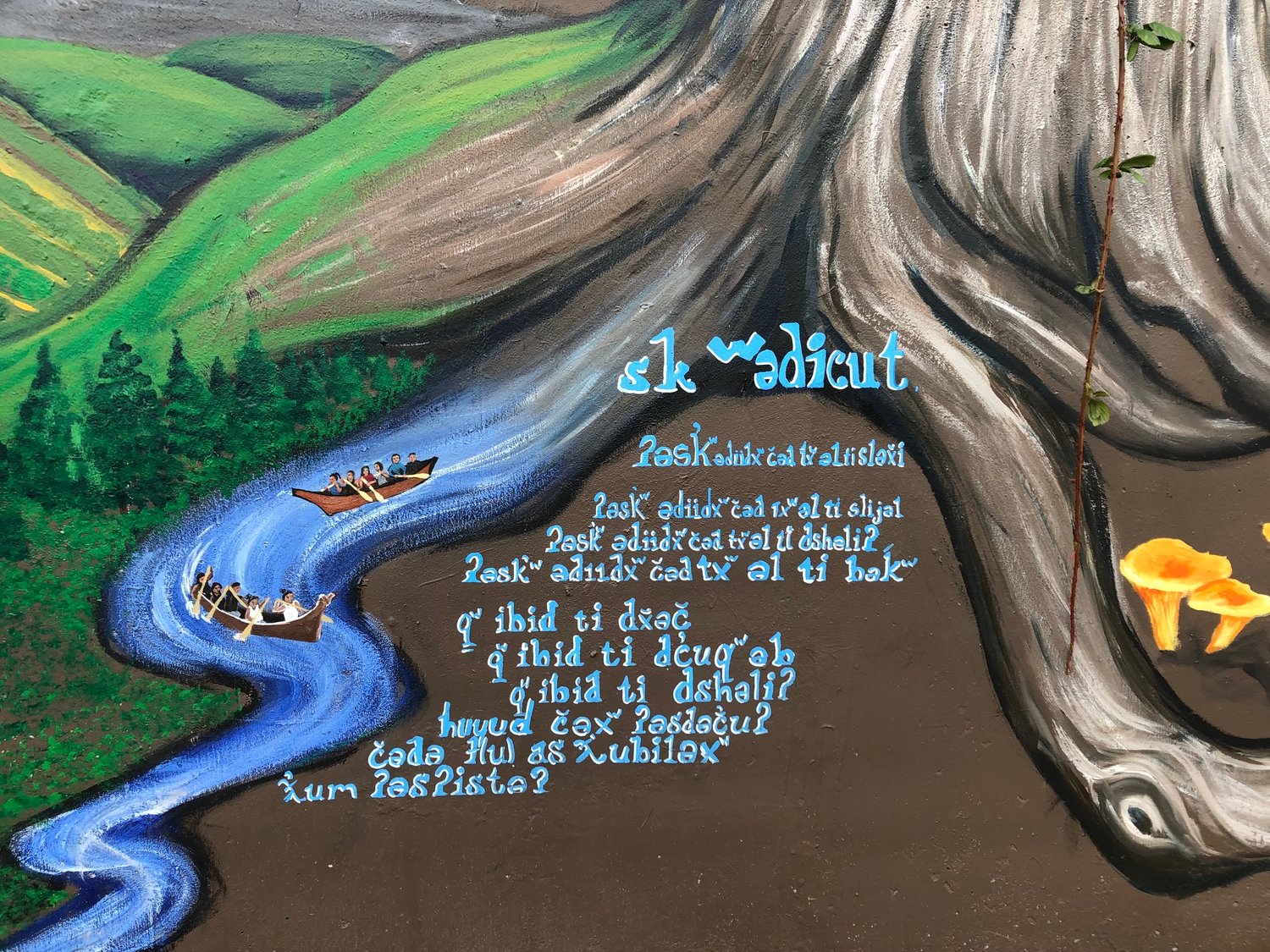 This Native American prayer is painted in a dialect of the Lushootseed language on the Climate Justice Wall in west Olympia. See translation in the next photo.