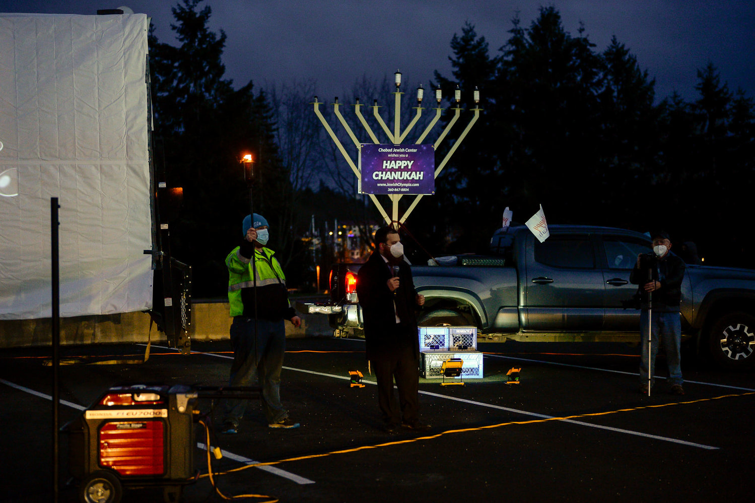 The 10-foot-high giant Chanukah menorah stood in the bed of a pickup truck at the 2020 lighting ceremony before being moved to Sylvester Park in downtown Olympia.