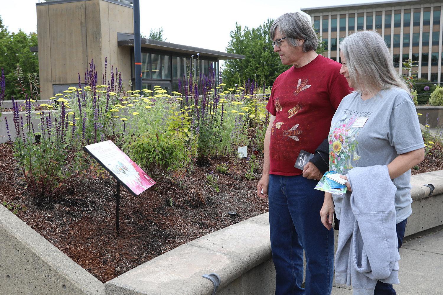 Paul and Penny Longwell of Olympia at the June 22, 2022 opening of the Capitol Campus Pollinator Garden. Penny is a gardener and Paul a beekeeper