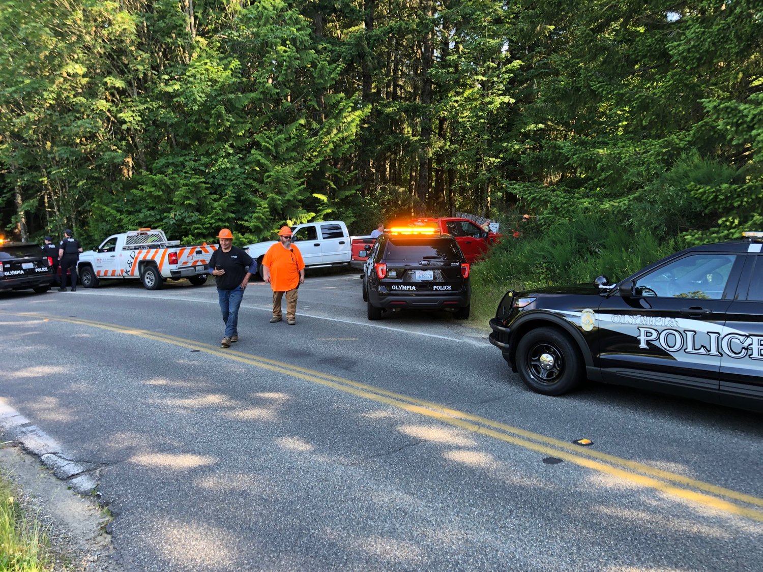 Four police vehicles and at least five officers were on the scene at Cooper Crest Forest on the morning of June 27, 2022.