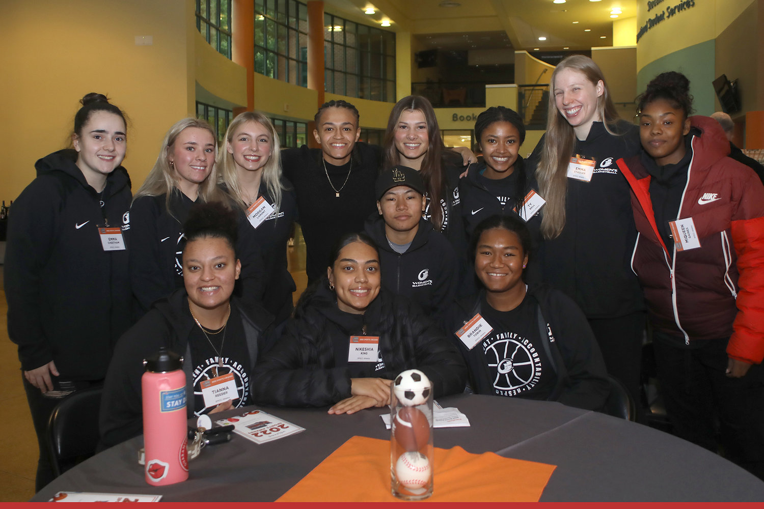 Women Sports Star nominee Sharay Trotter (center) with her basketball team from South Puget Sound Community College.