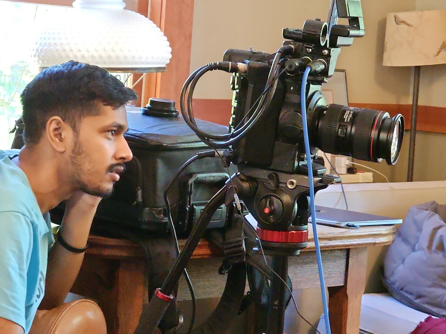 Rishi Sharma operating his camera. July 3, 2023.