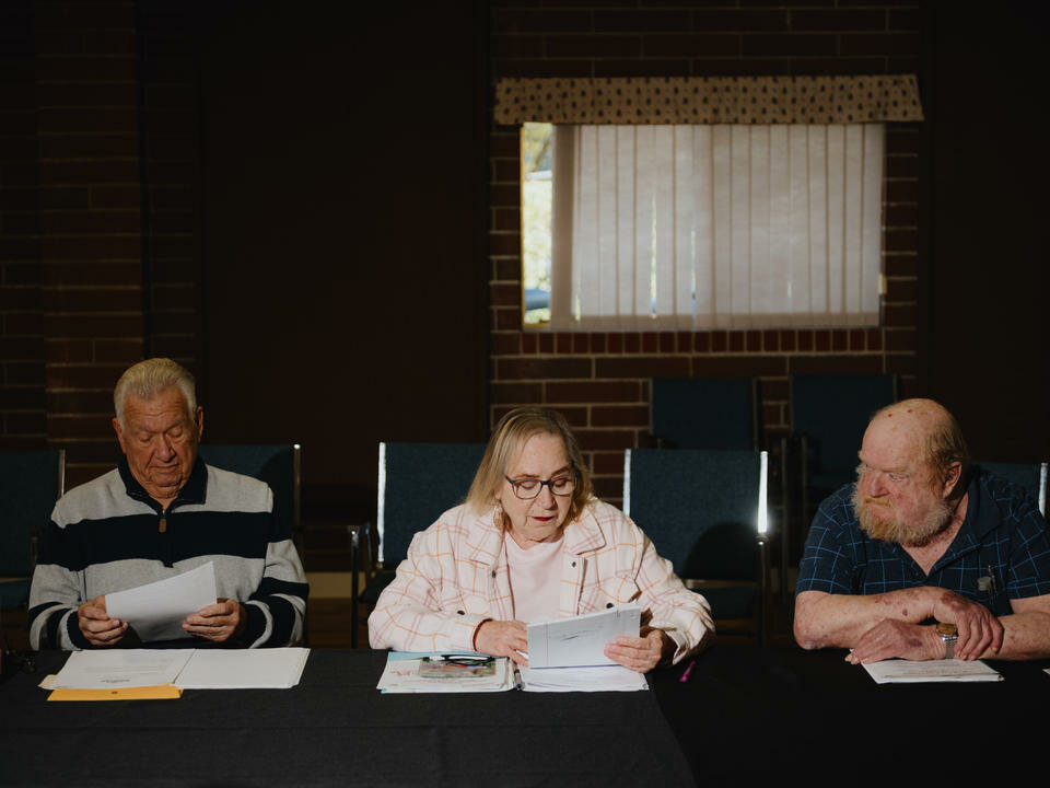 Warren Hoffman, Aliene Olsen, and Ken Clark, members of a budding tenant association at Western Plaza, a mobile home and senior living community in Tumwater, Wash., meet on Monday, Nov 13, 2023. (Grant Hindsley for Crosscut)